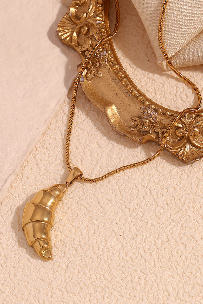 Croissant pendant necklace
