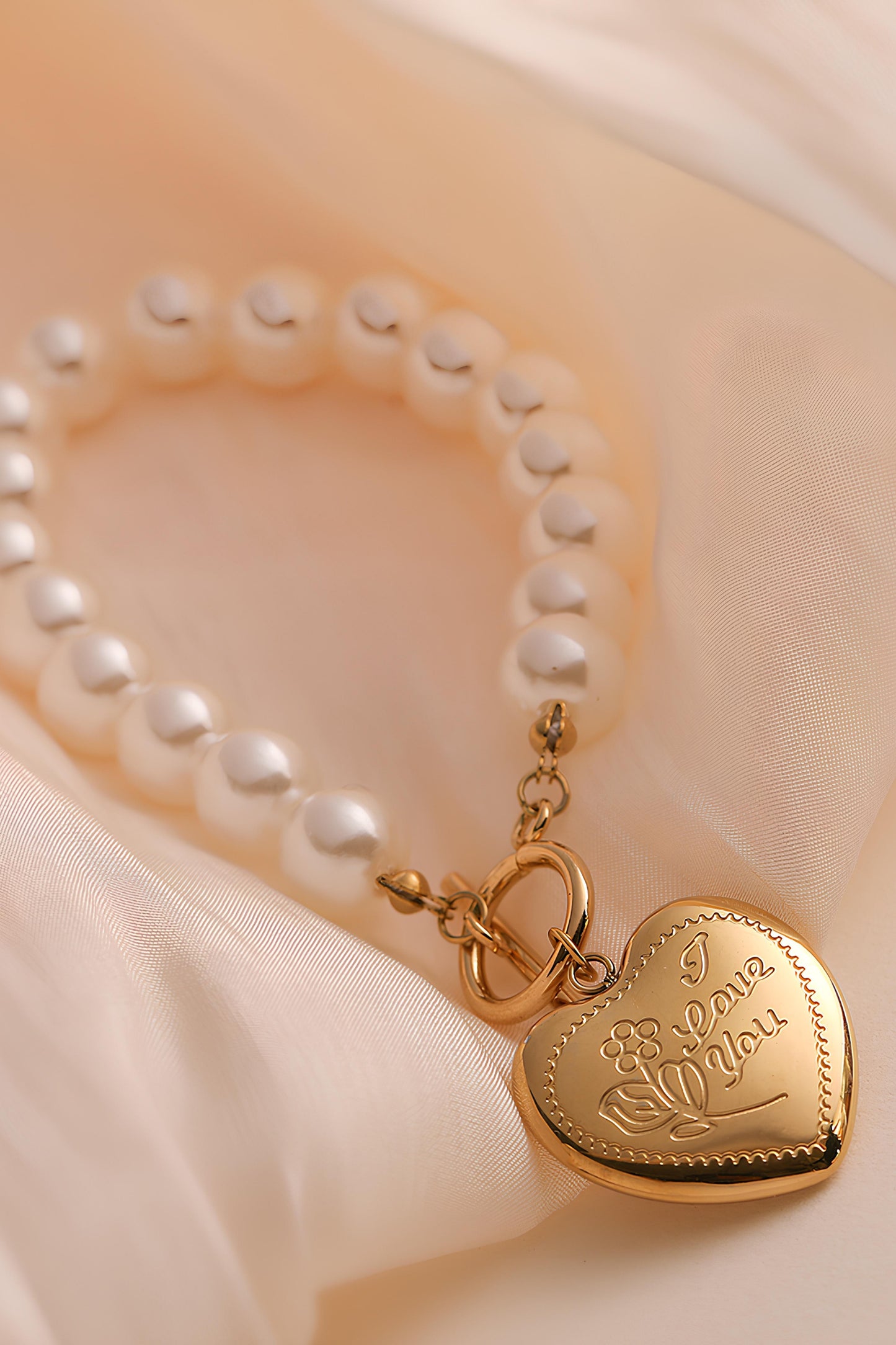 Pearl Heart Pendant Bracelet