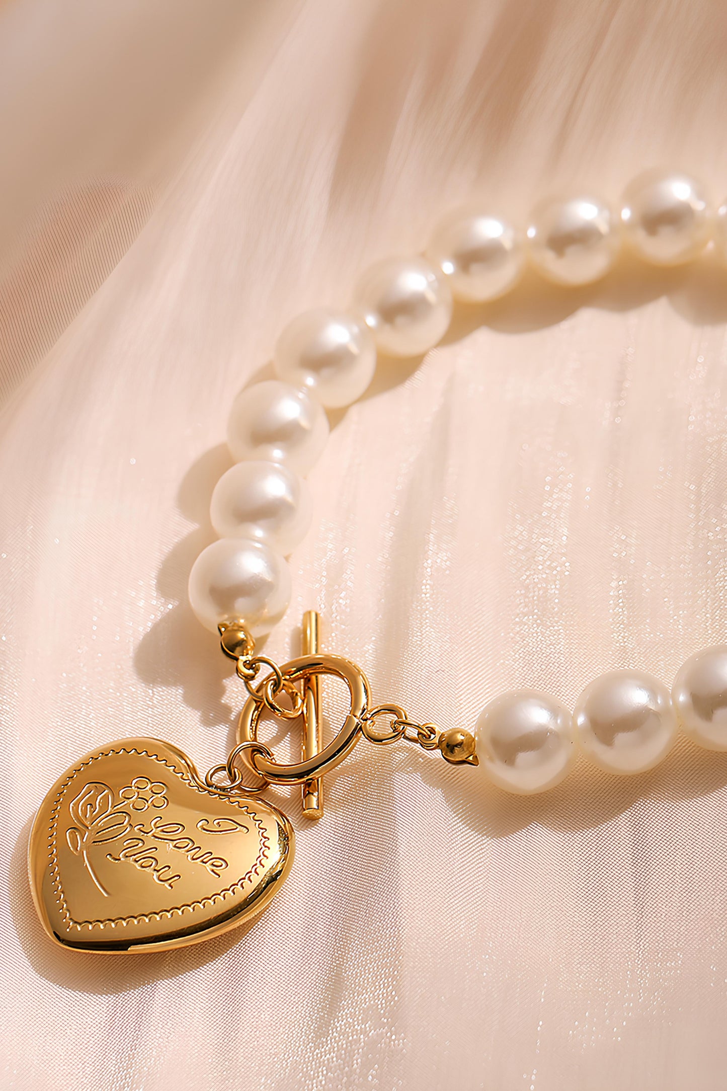 Pearl Heart Pendant Bracelet