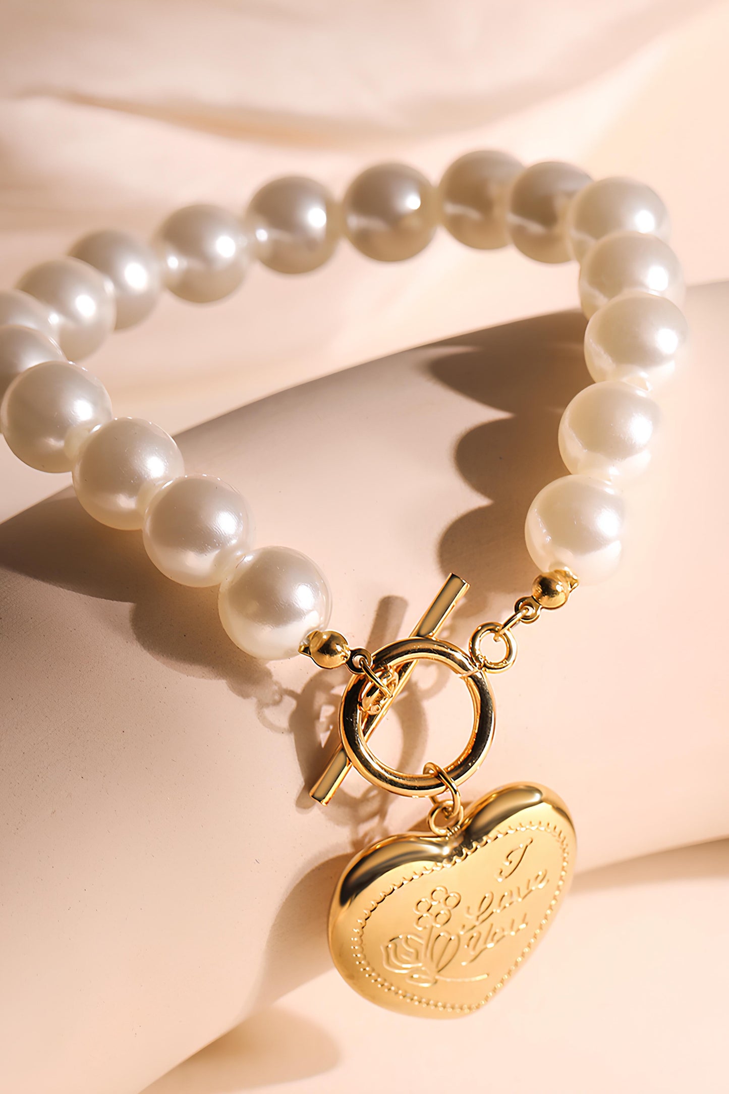 Pearl Heart Pendant Bracelet